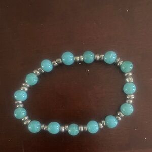 Turquoise colored and Silver gun metal toned Beaded stretch Bracelet